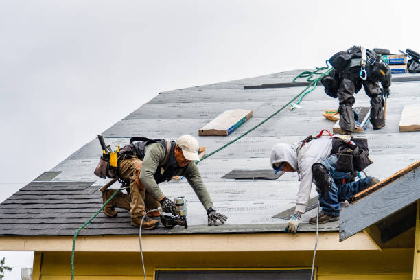 Professional Roofing technician working in West Warren, MA
